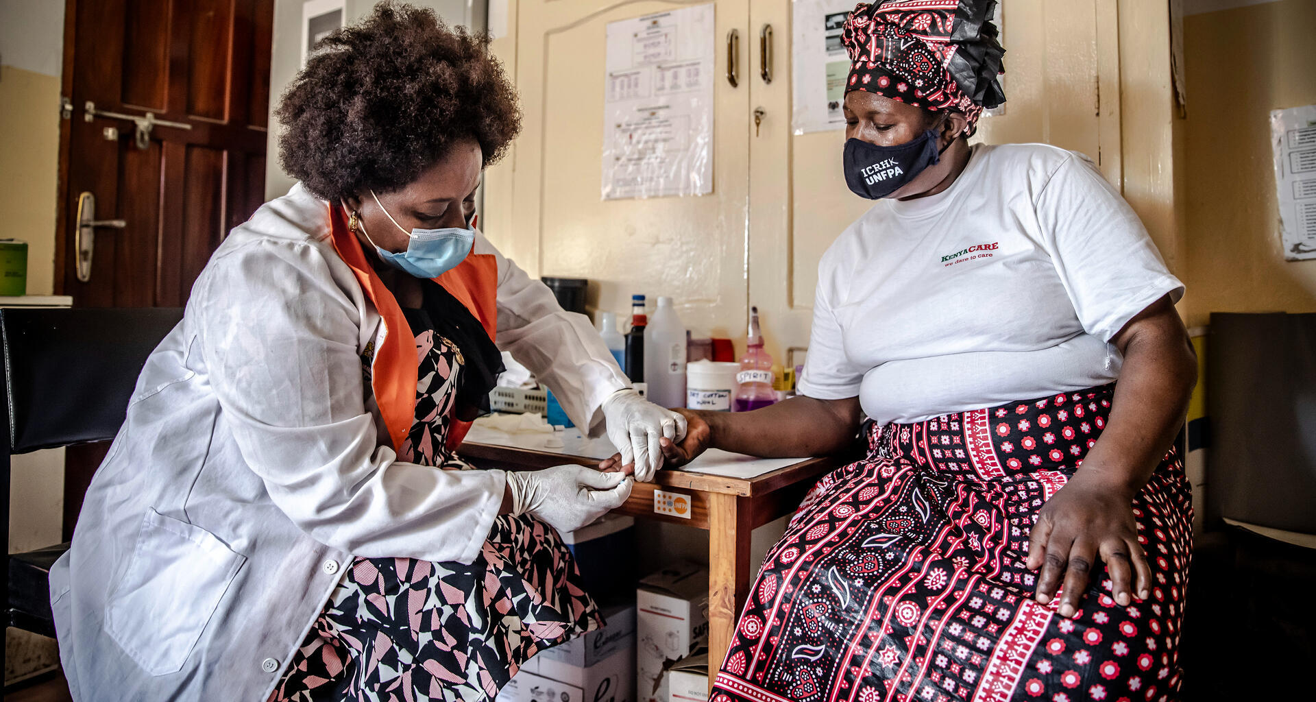 A woman receives a HIV test.